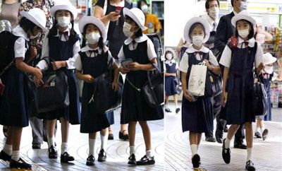 Японцы бросили мобильники на борьбу со свиным гриппом